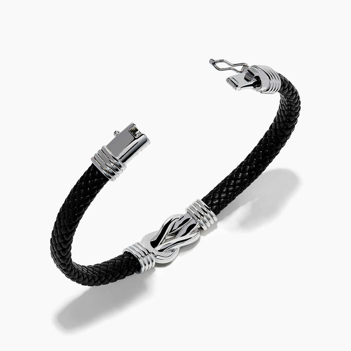 The Men's 925 Sterling Silver Black Spinel Leather Bracelet features black braided leather, sterling silver accents, and a decorative clasp with a black and silver loop design, displayed on a white background.