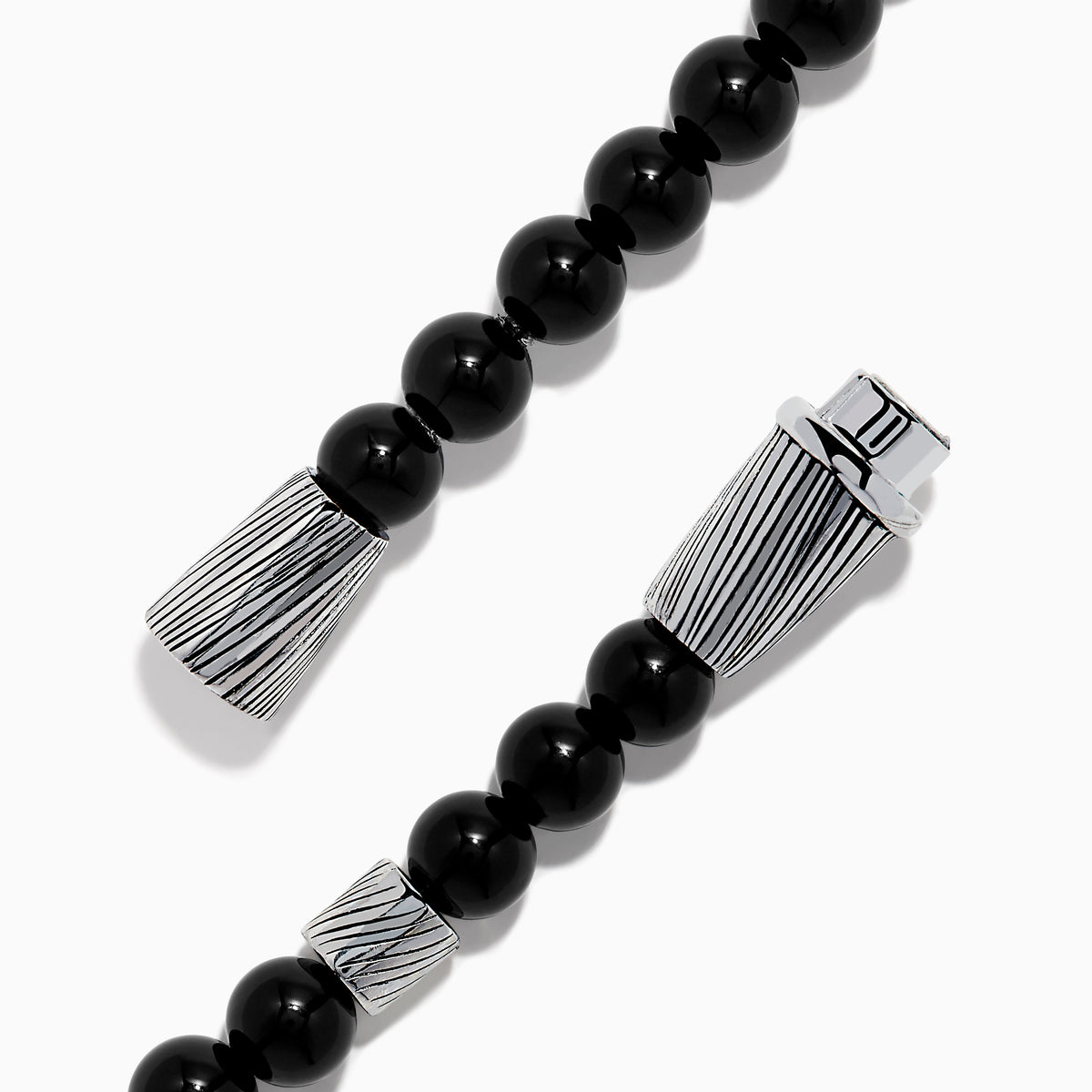 The Men's 925 Sterling Silver Tiger's Eye and Onyx Beaded Bracelet features alternating brown Tiger's Eye and black Onyx beads, accented by a textured sterling silver cylindrical clasp, shown on a white background.