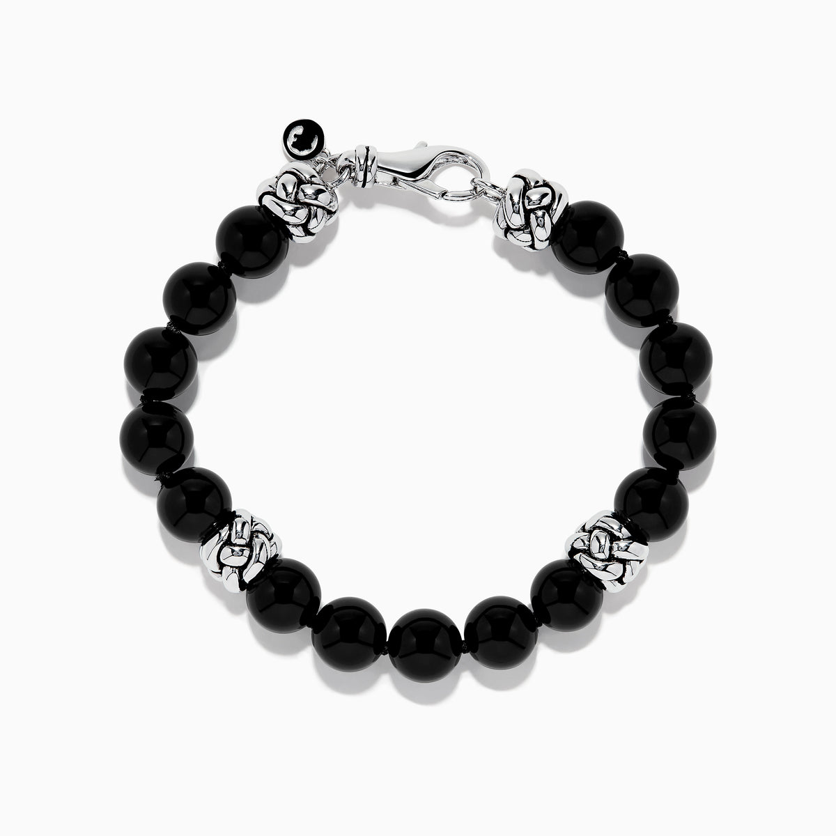 The Mens 925 Sterling Silver Onyx Bracelet features shiny black round beads, three ornate sterling silver spacers, a silver lobster clasp, and a small charm, displayed on a white background.