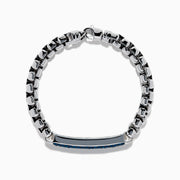 The Mens 925 Sterling Silver London Blue Topaz Bracelet showcases a chunky polished silver chain with a rectangular bar centerpiece adorned with small, round London Blue Topaz gemstones.