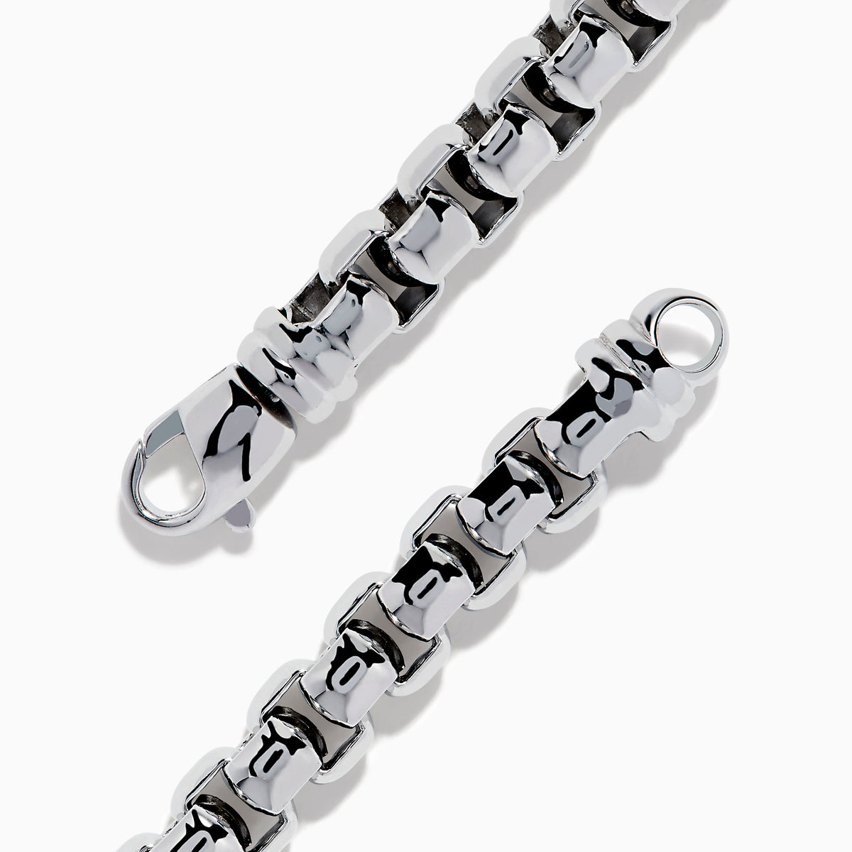 The Mens 925 Sterling Silver London Blue Topaz Bracelet showcases a chunky polished silver chain with a rectangular bar centerpiece adorned with small, round London Blue Topaz gemstones.