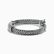 The Mens 925 Sterling Silver White Sapphire Braided Chain Bracelet features a rectangular white sapphire-encrusted centerpiece and a round clasp, shown on a white background.