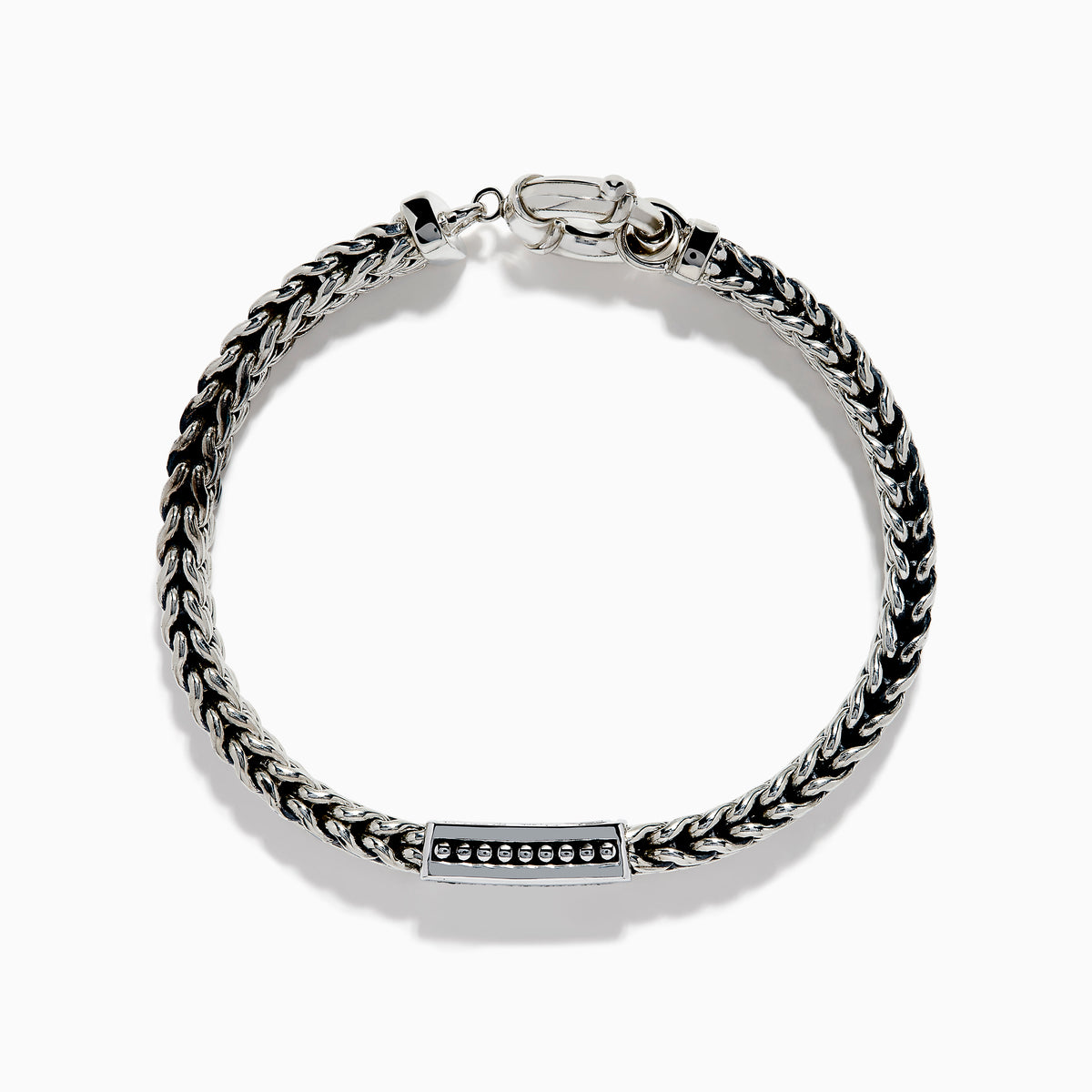 The Men's 925 Sterling Silver Black Spinel Chain-Link Bracelet features black and silver woven links, a rectangular clasp accented with black spinel stones, and a round spring-ring closure at the top.