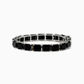 The 925 Sterling Silver Onyx Tennis Bracelet features rectangular black onyx stones in a sleek silver link design, shown on a white background—an elegant accessory for any occasion.