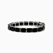 The 925 Sterling Silver Onyx Tennis Bracelet features rectangular black onyx stones in a sleek silver link design, shown on a white background—an elegant accessory for any occasion.