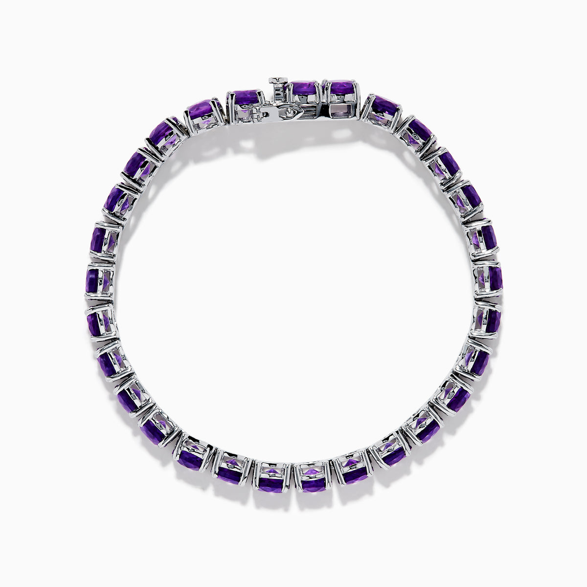 The 925 Sterling Silver Purple Amethyst Bracelet is shown on a plain white background, featuring faceted round amethyst gemstones in a classic tennis style.