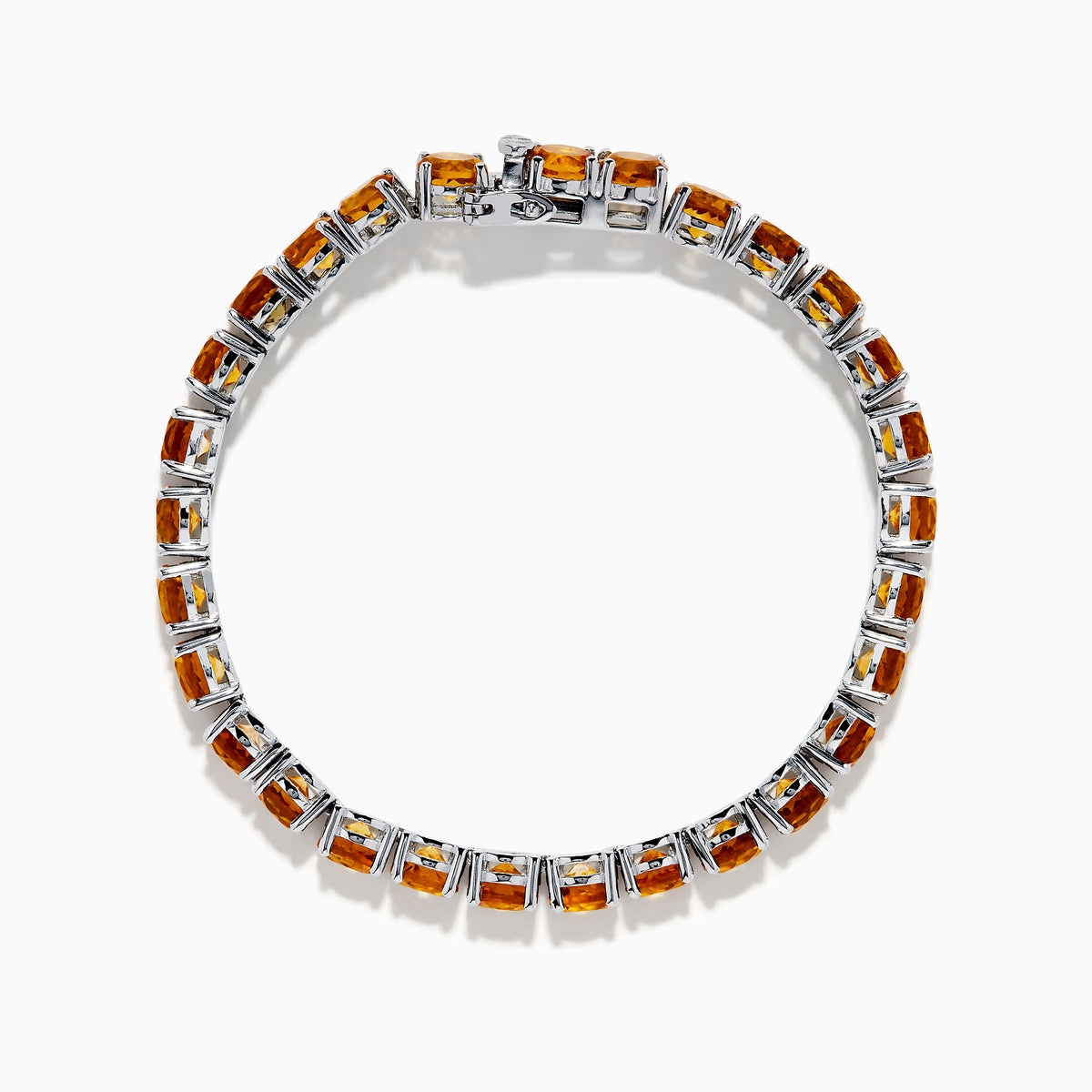 The 925 Sterling Silver Citrine Bracelet showcases a single row of round, faceted amber-orange citrine stones in prong settings against a white background.