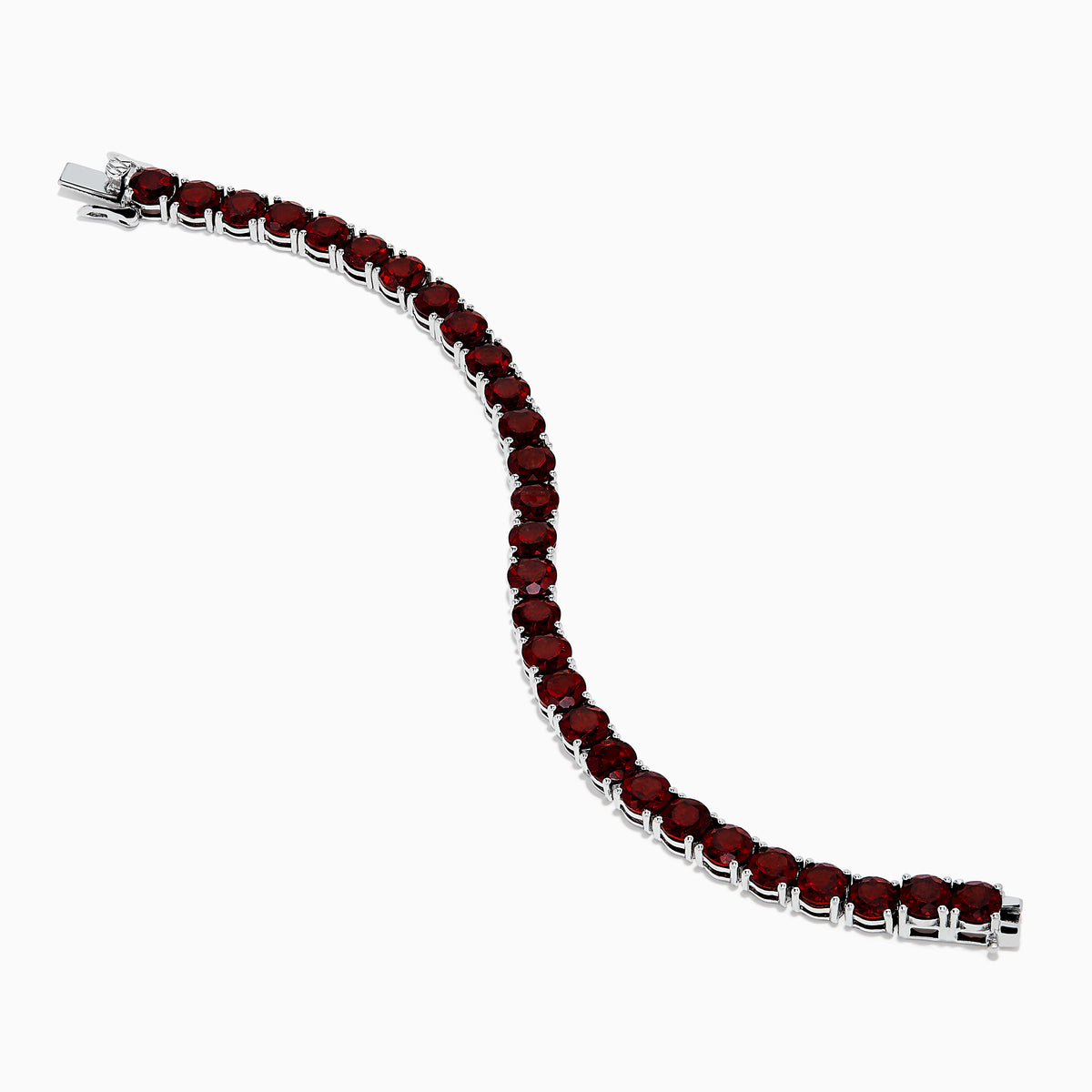 The 925 Sterling Silver Garnet Bracelet features round, deep red garnets set in individual prongs along a sleek tennis chain, beautifully arranged in a circular shape on a white background.
