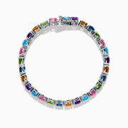 The 925 Sterling Silver Mix Stone Bracelet features round multicolored gemstones—blue, green, yellow, pink, orange, and purple—displayed on a white background.