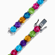 The 925 Sterling Silver Mix Stone Bracelet features round multicolored gemstones—blue, green, yellow, pink, orange, and purple—displayed on a white background.