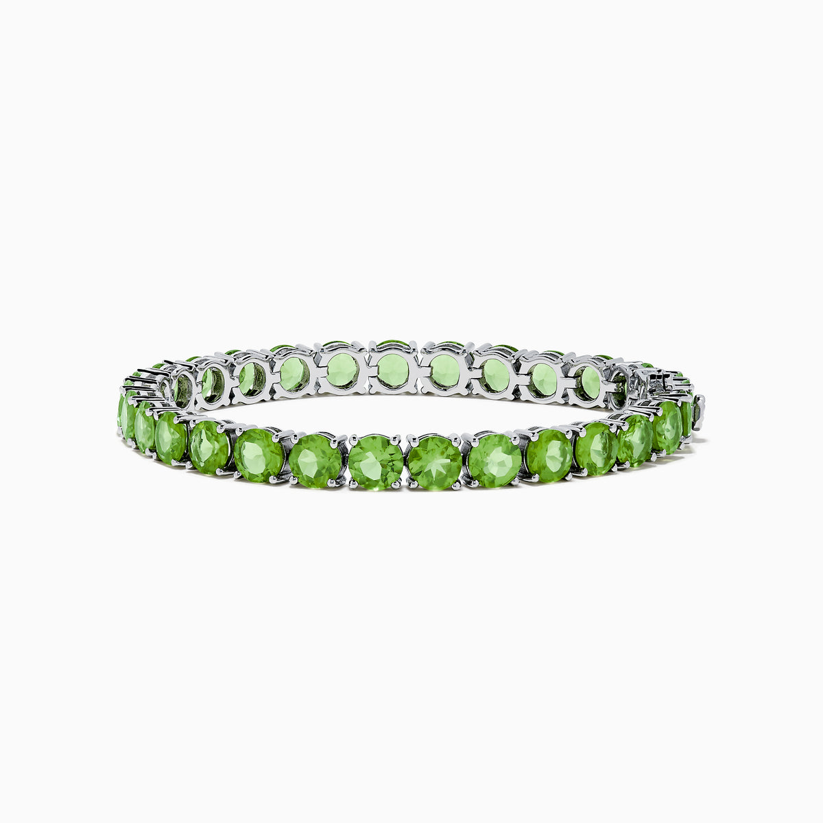 The 925 Sterling Silver Peridot Bracelet showcases a row of oval, bright green gemstones set against a white background for a striking look.