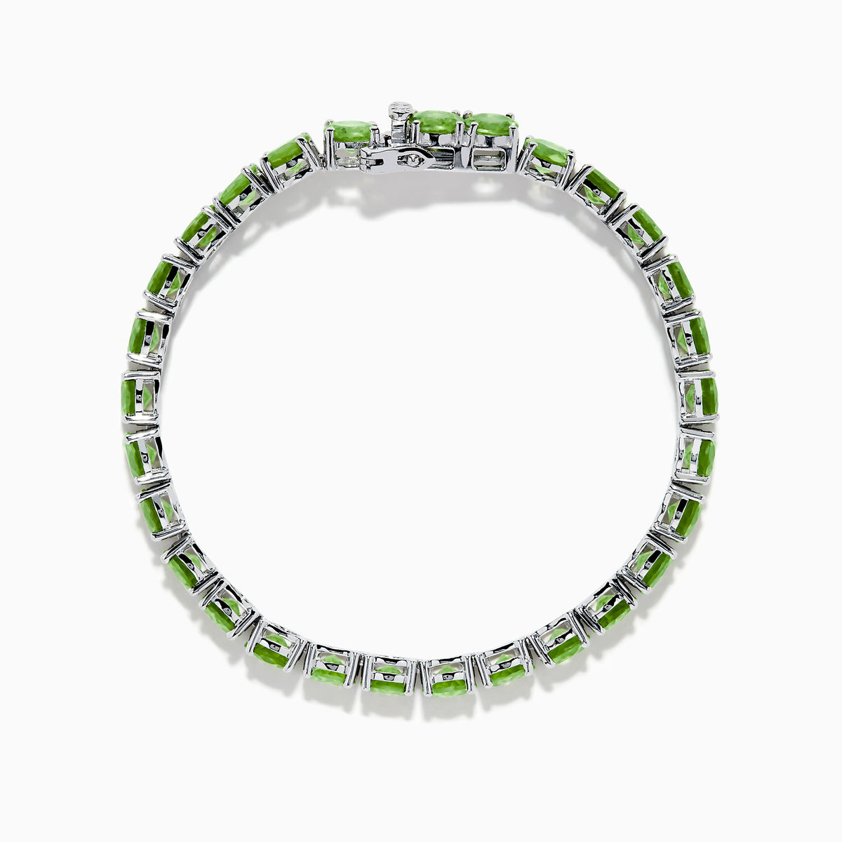 The 925 Sterling Silver Peridot Bracelet showcases a row of oval, bright green gemstones set against a white background for a striking look.