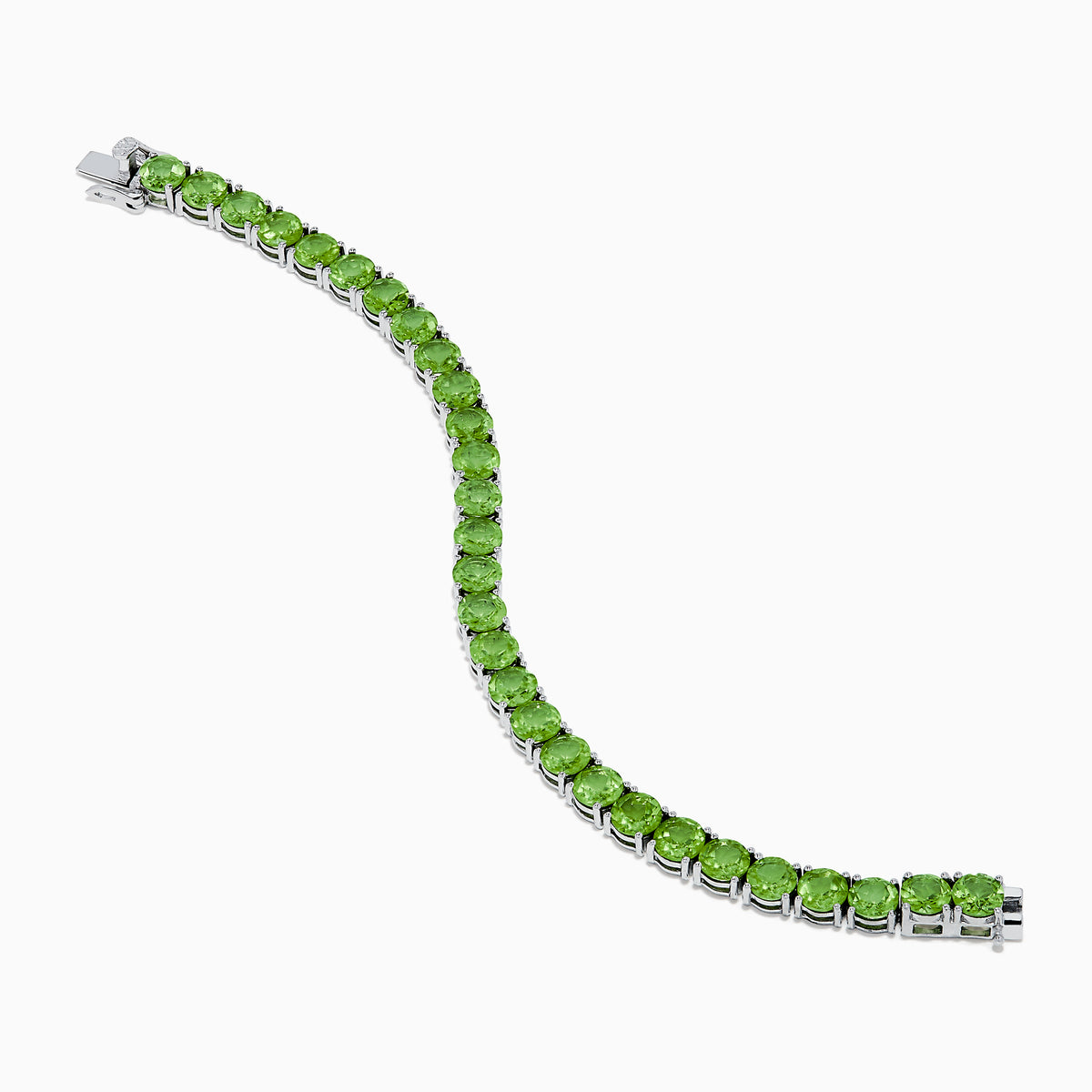 The 925 Sterling Silver Peridot Bracelet showcases a row of oval, bright green gemstones set against a white background for a striking look.