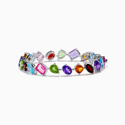 The Mosaic 925 Sterling Silver Multi Gemstone Bracelet features vibrant, multi-shaped gemstones set in sterling silver for a striking and eye-catching look.