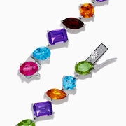 The Mosaic 925 Sterling Silver Multi Gemstone Bracelet features vibrant, multi-shaped gemstones set in sterling silver for a striking and eye-catching look.