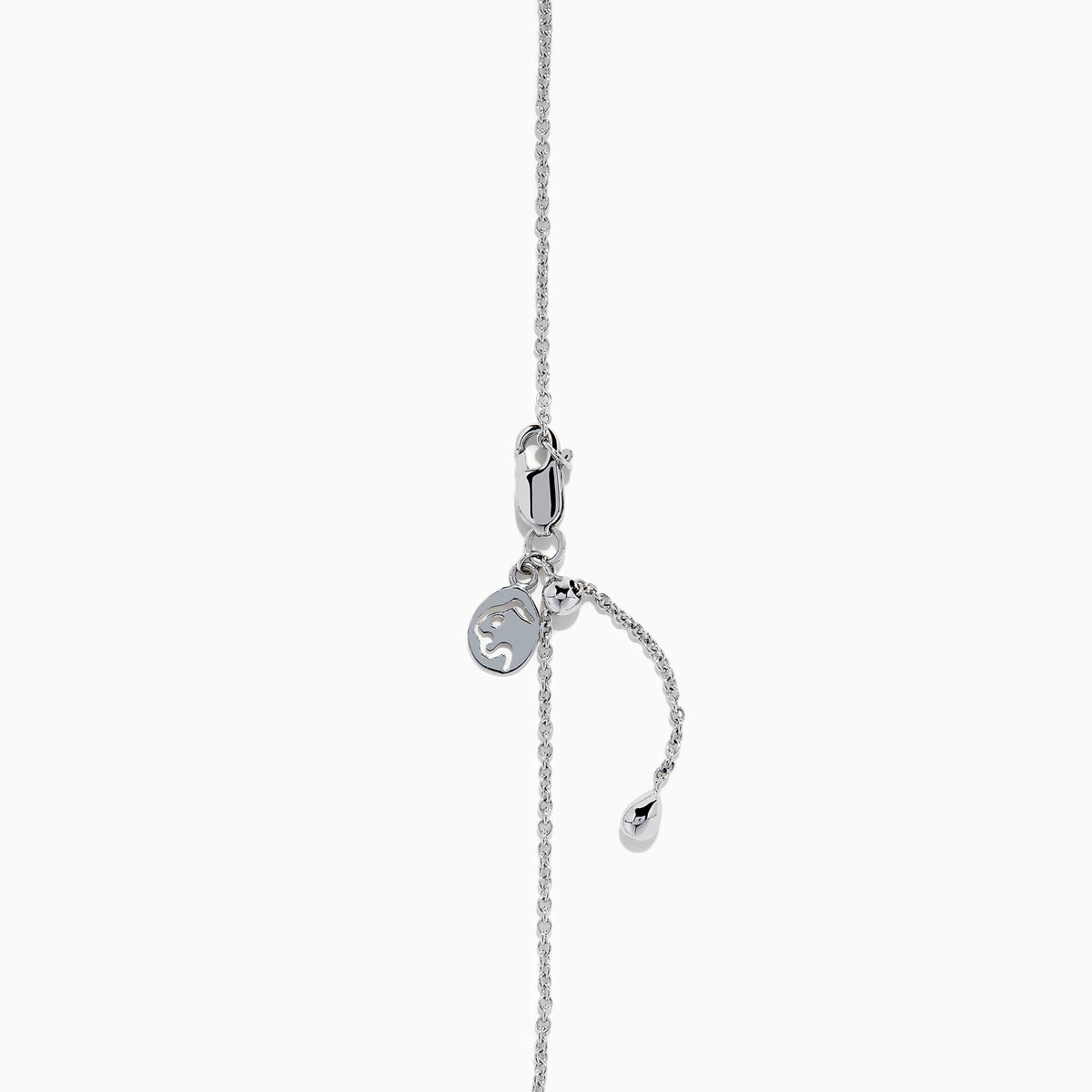 The Ocean Bleu 14K White Gold Blue Topaz and Diamond Bolo Bracelet features a delicate chain, a central round blue topaz, sparkling diamonds, and an adjustable clasp with a small charm near the closure.