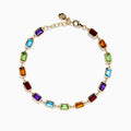 The Mosaic 14K Yellow Gold Bezel Multi Color Gemstone Bracelet showcases blue, green, purple, red, and amber rectangular stones evenly spaced along a delicate chain with an adjustable clasp.