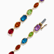 The Mosaic 14K Yellow Gold Multi Color Gemstone Bracelet features evenly spaced ovals, teardrops, and rectangles in vibrant hues along an elegant yellow gold band.