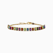 The Mosaic 14K Yellow Gold Multi Color Gemstone Beaded Chain Bracelet showcases rectangular multicolored gemstones in a row, with a clasp and adjustable beaded chain, shown on a white background.