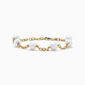 The 14K Fresh Water Pearl Station Bracelet features evenly spaced round fresh water pearls set in 14K gold, shown on a plain white background.