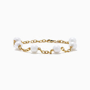 The 14K Fresh Water Pearl Station Bracelet features evenly spaced round fresh water pearls set in 14K gold, shown on a plain white background.