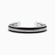 The Mens 925 Sterling Silver Leather Bangle features a diagonal rope-like pattern with dark accents along the edges and is displayed on a white background.