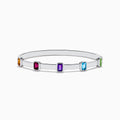 The Mosaic 925 Sterling Silver Multicolor Gemstone Bangle features five rectangular orange, red, purple, blue, and green gemstones evenly spaced around the band, shown on a white background.