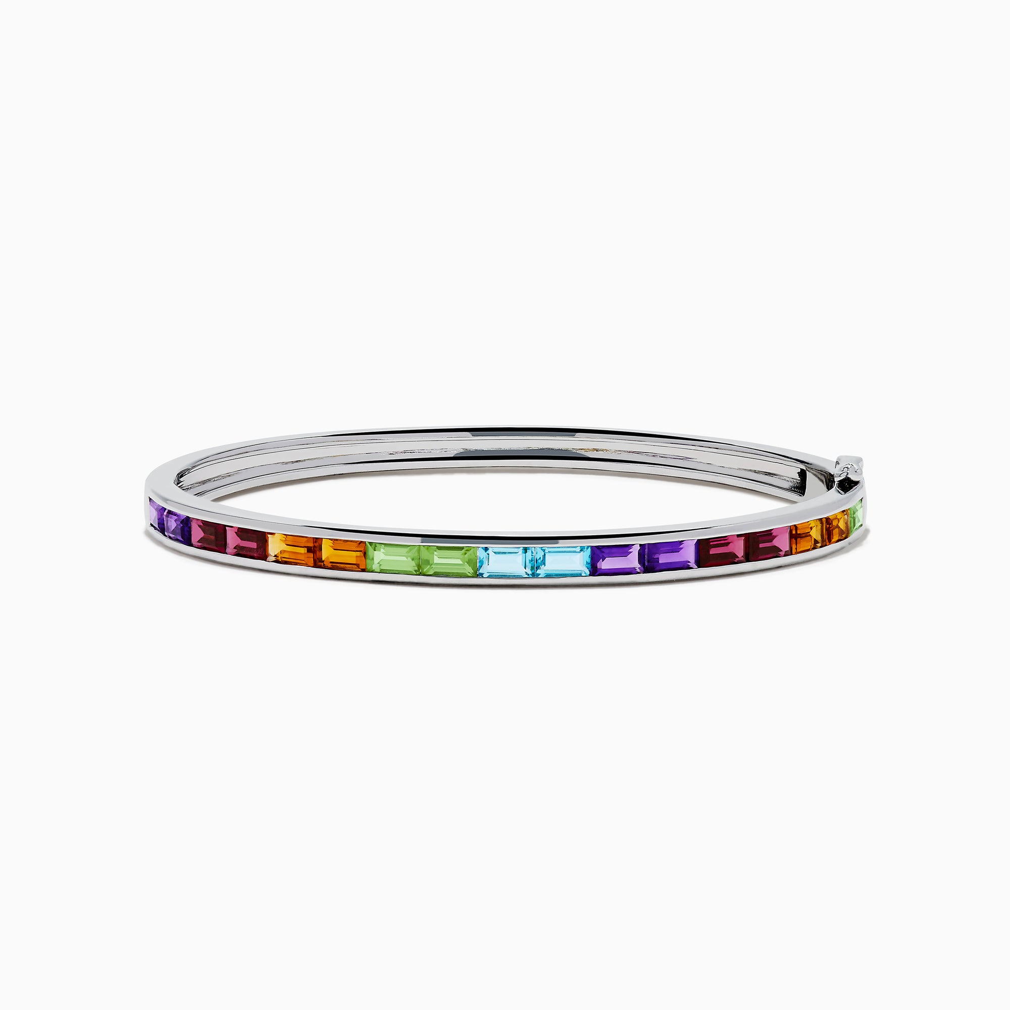 The 925 Sterling Silver Baguette Multi Color Gemstone Bangle showcases a row of vibrant rainbow-hued gemstones set along the front.