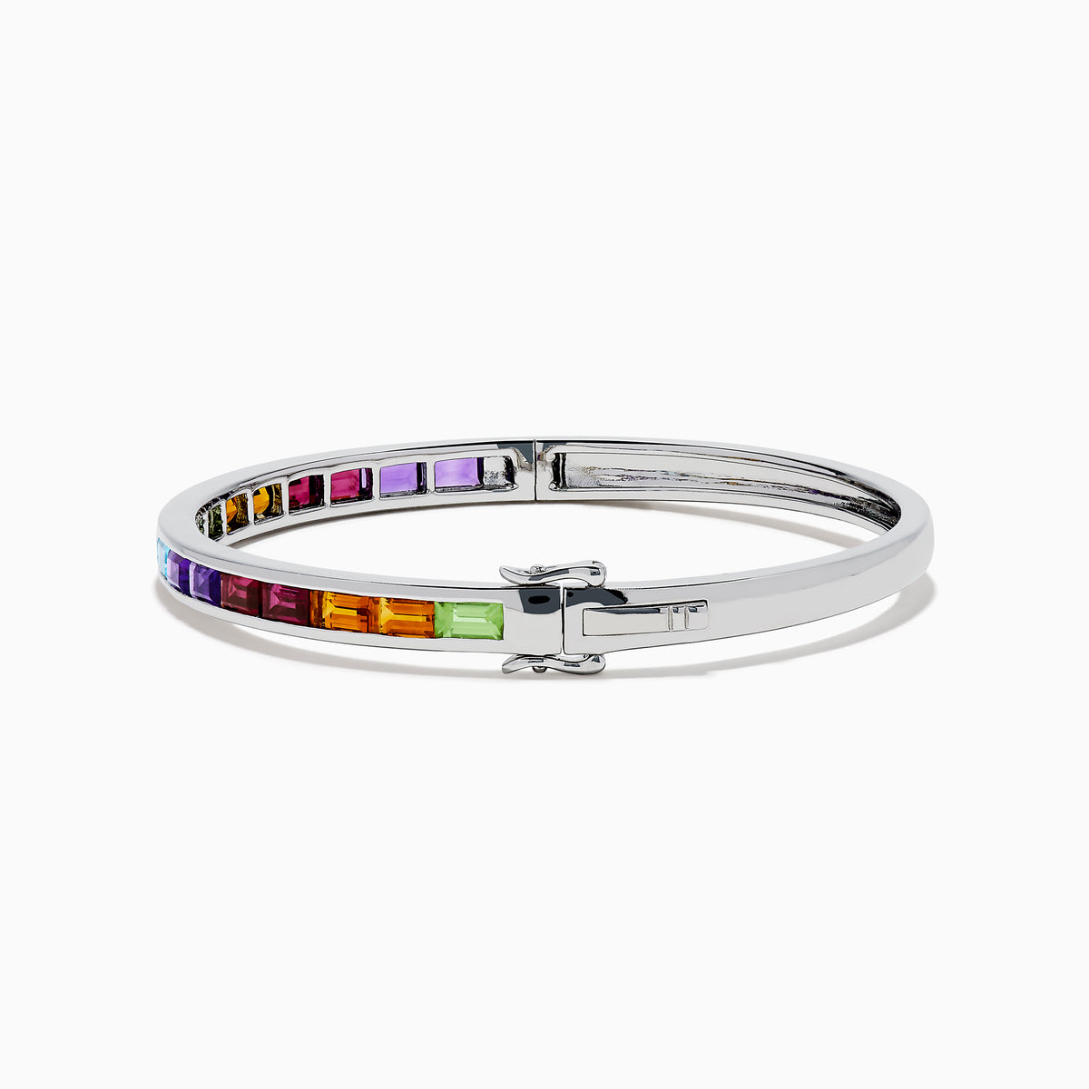 The 925 Sterling Silver Baguette Multi Color Gemstone Bangle showcases a row of vibrant rainbow-hued gemstones set along the front.