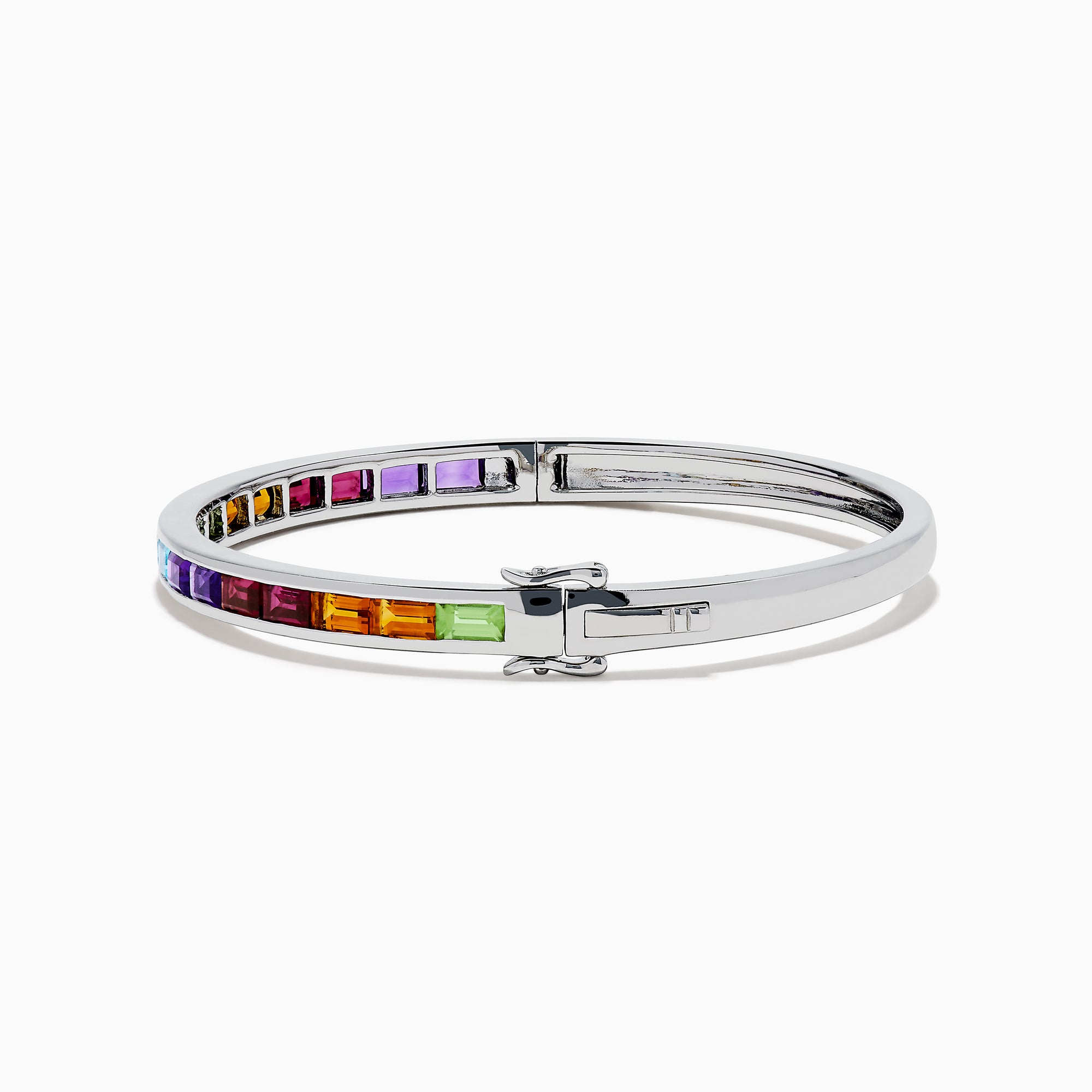 The 925 Sterling Silver Baguette Multi Color Gemstone Bangle showcases a row of vibrant rainbow-hued gemstones set along the front.