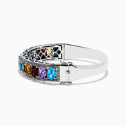 The Mosaic 925 Sterling Silver Multi Color Gemstone Bangle features a single row of round red, blue, green, orange, and purple gemstones with a decorative beaded border.