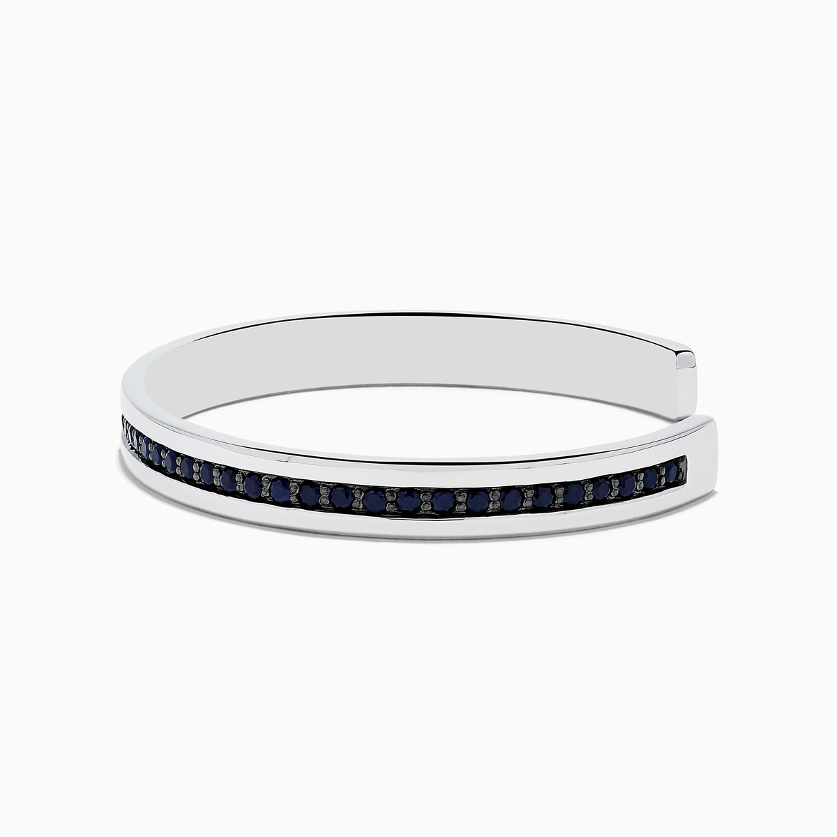 A sleek Mens 925 Sterling Silver Black Sapphire Cuff Bangle (4.09 TCW) features a single row of dark sapphires along the center, an open-ended design, polished finish, and modern appeal.