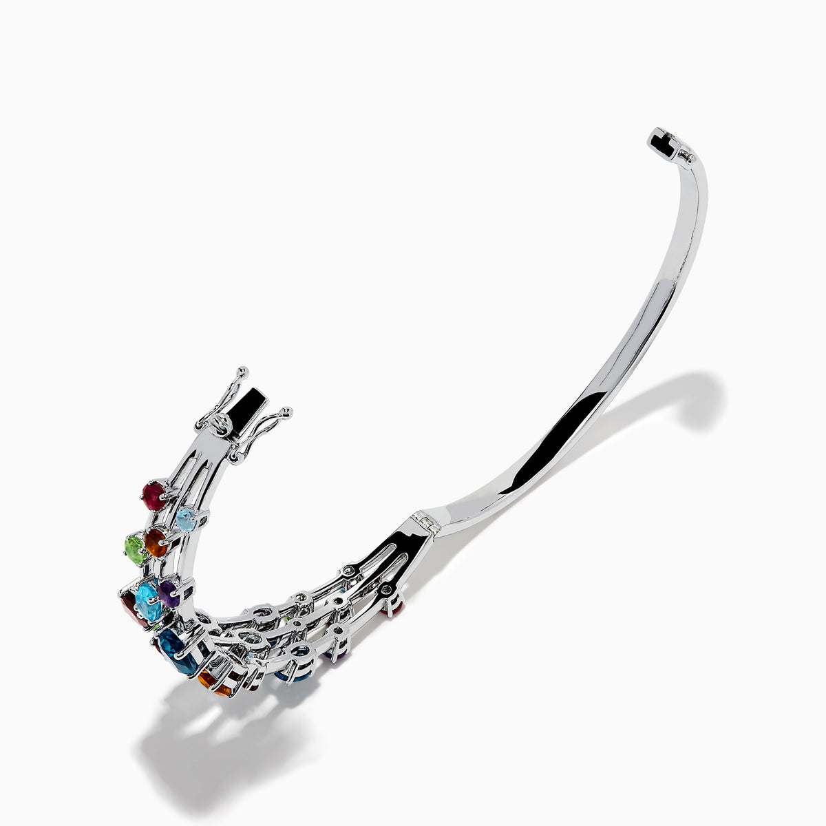 The 925 Sterling Silver Multi Color Gemstone 3 Row Statement Bangle showcases vibrant blue, red, purple, green, and orange stones in various shapes and sizes—a bold accessory for any jewelry collection.