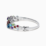The 925 Sterling Silver Multi Color Gemstone 3 Row Statement Bangle showcases vibrant blue, red, purple, green, and orange stones in various shapes and sizes—a bold accessory for any jewelry collection.