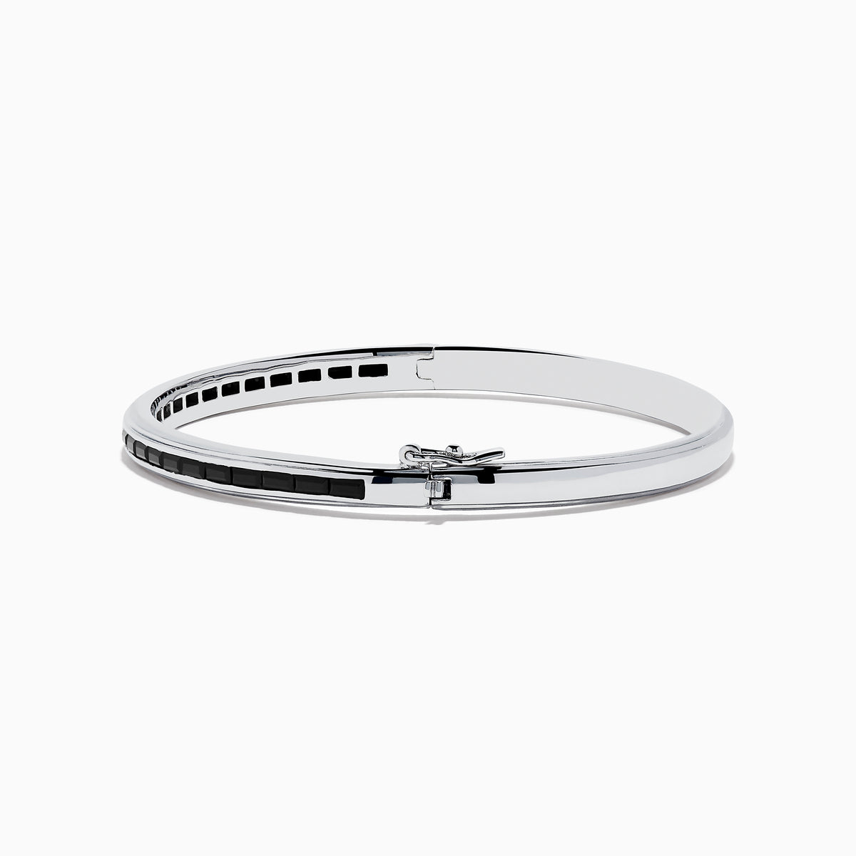 The 925 Sterling Silver Black Spinel Bangle features a sleek design with a row of rectangular black spinel stones set along the center.
