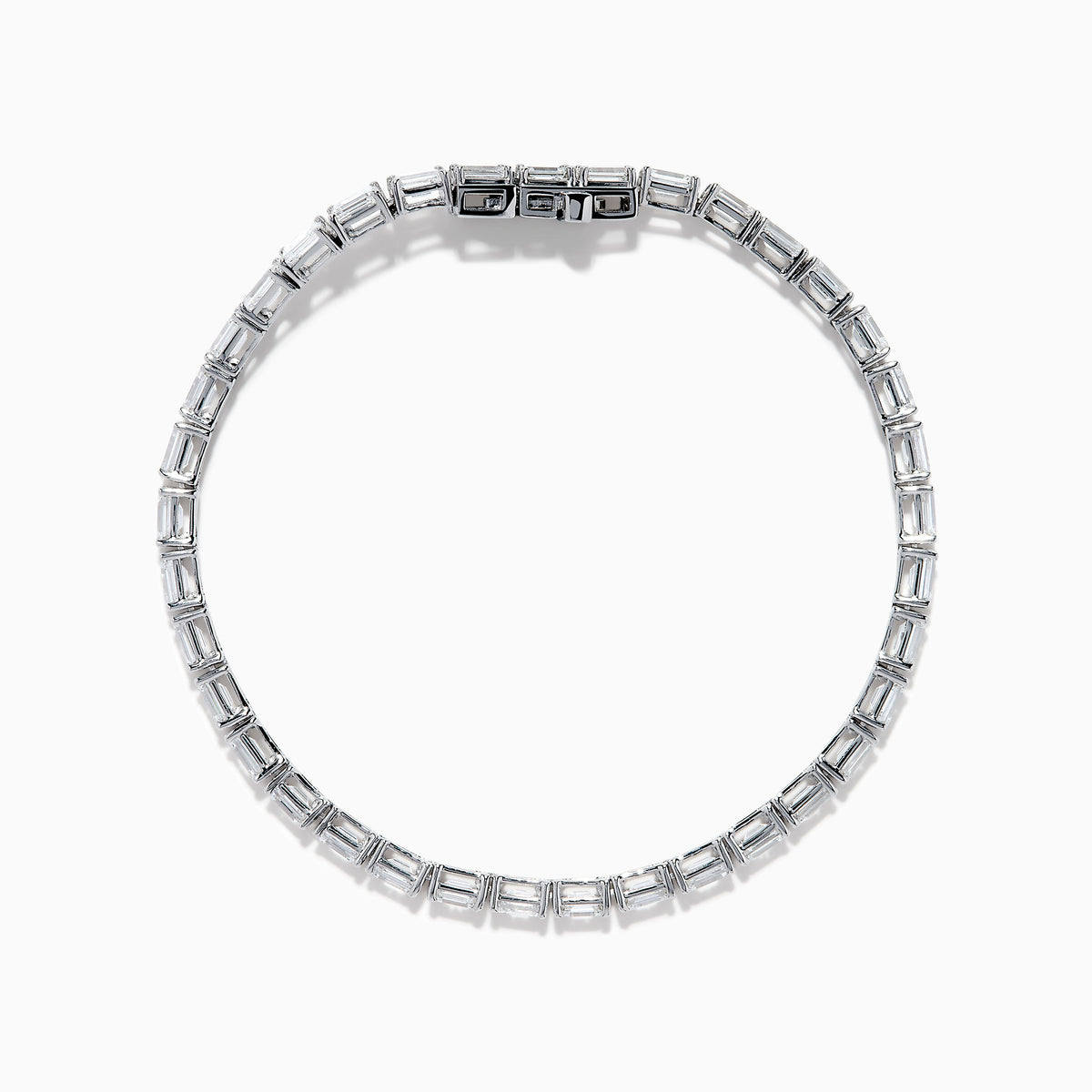 A Lab Grown Emerald Cut Diamond 7.50ct Tennis Bracelet in 14K White Gold is shown, featuring a continuous row of rectangular lab grown diamonds on a plain white background.