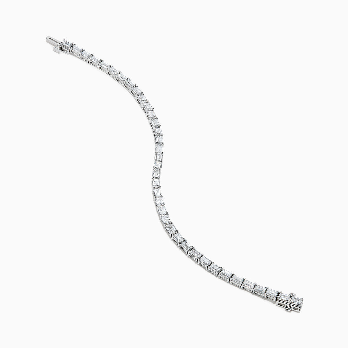 A Lab Grown Emerald Cut Diamond 7.50ct Tennis Bracelet in 14K White Gold is shown, featuring a continuous row of rectangular lab grown diamonds on a plain white background.