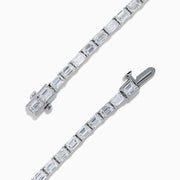 A Lab Grown Emerald Cut Diamond 7.50ct Tennis Bracelet in 14K White Gold is shown, featuring a continuous row of rectangular lab grown diamonds on a plain white background.