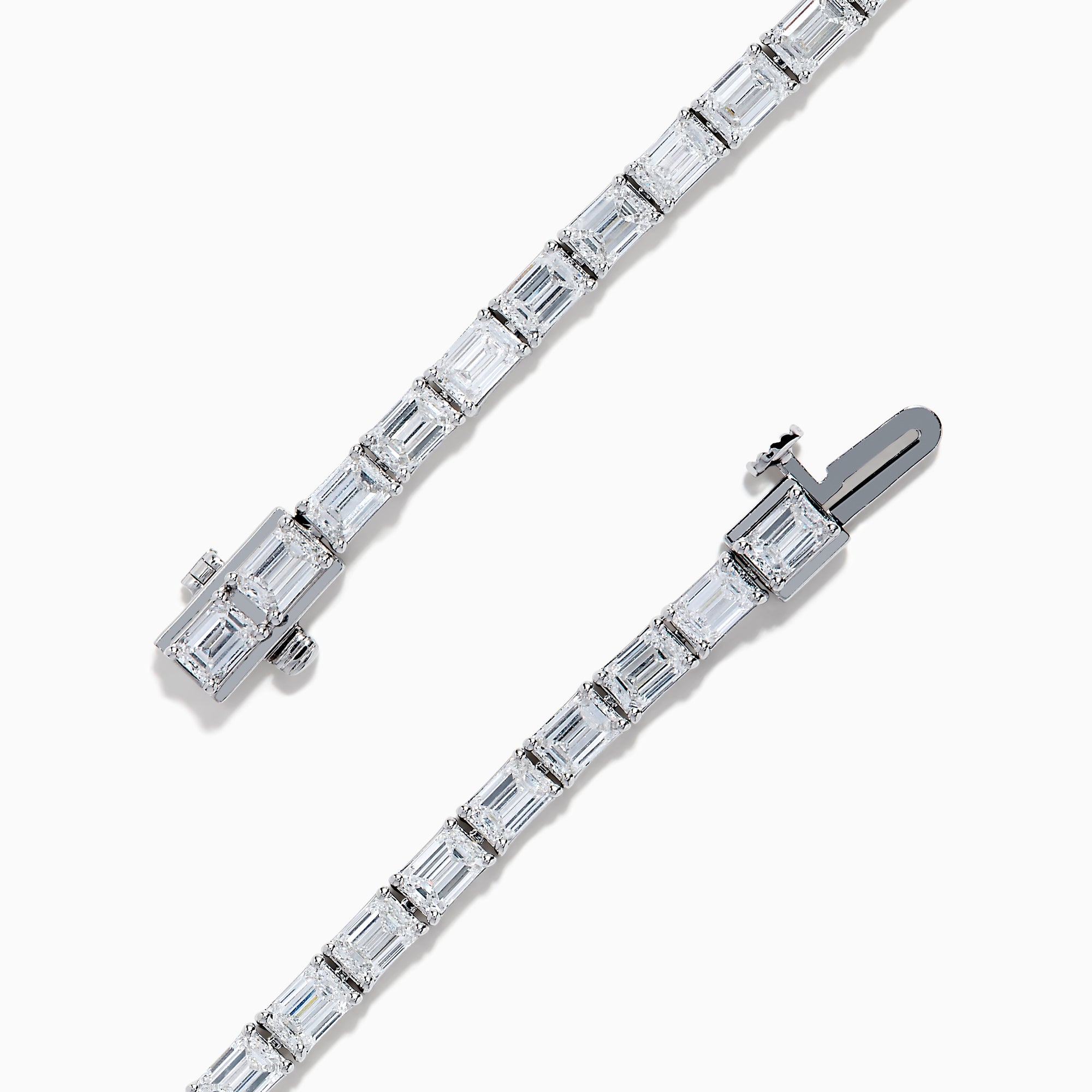 A Lab Grown Emerald Cut Diamond 7.50ct Tennis Bracelet in 14K White Gold is shown, featuring a continuous row of rectangular lab grown diamonds on a plain white background.