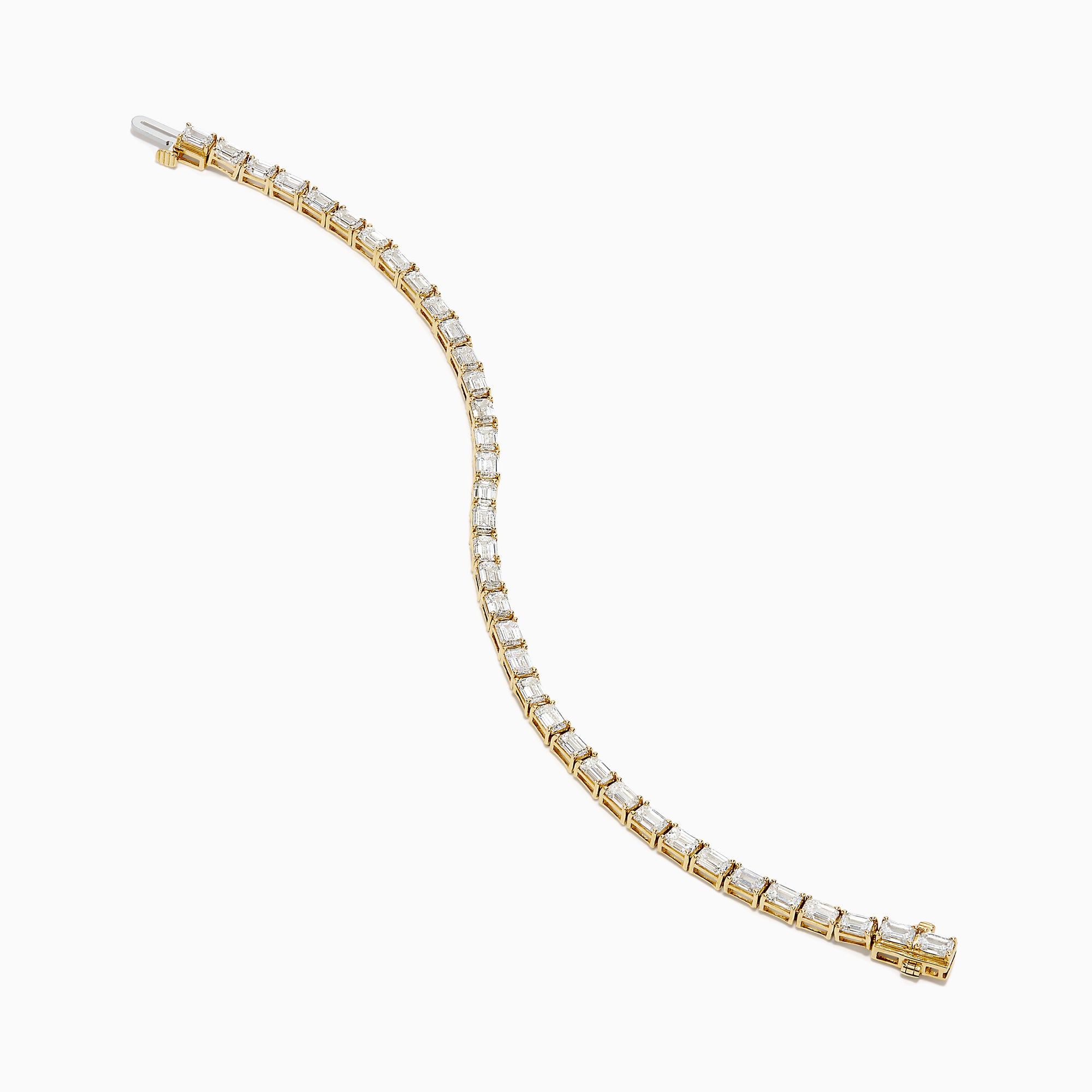 The Lab Grown Emerald Cut Diamond 7.50ct Tennis Bracelet in 14K Yellow Gold features a single row of rectangular lab-grown diamonds, elegantly set and displayed on a plain white background.