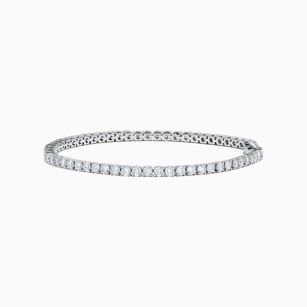 The Lab Grown Round Diamond 5.00ct Tennis Bracelet in 14K White Gold, featuring a single row of sparkling diamonds, is displayed against a plain white background.