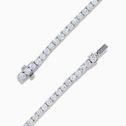 The Lab Grown Round Diamond 5.00ct Tennis Bracelet in 14K White Gold, featuring a single row of sparkling diamonds, is displayed against a plain white background.