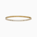 The Lab Grown Round Diamond 5.00ct Tennis Bracelet in 14K Yellow Gold features a single row of sparkling lab grown diamonds, shown on a plain white background.