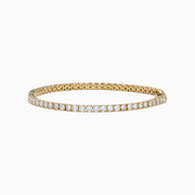 The Lab Grown Round Diamond 5.00ct Tennis Bracelet in 14K Yellow Gold features a single row of sparkling lab grown diamonds, shown on a plain white background.