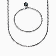 The Mens 925 Sterling Silver Minimalist Necklace and Bracelet Set is displayed on a white background, featuring a classic link design with round clasps.