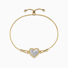 The 14K Yellow Gold Mother of Pearl Heart Bolo Bracelet features a central heart-shaped Mother of Pearl framed by gold beads, with an adjustable slider clasp on a delicate gold chain.