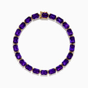 The 14K Yellow Gold Radiant Cut Amethyst Tennis Bracelet showcases a row of radiant cut amethysts in prong settings, displayed against a white background.