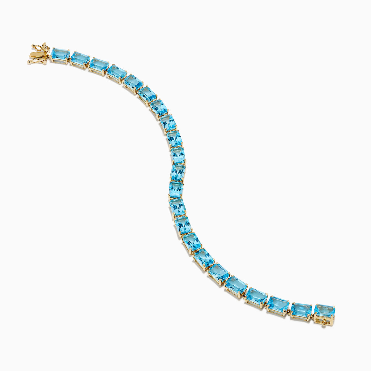 The Ocean Bleu 14K Yellow Gold Radiant Cut Blue Topaz Tennis Bracelet features rectangular blue topaz gemstones set in individual links, displayed on a plain white background.