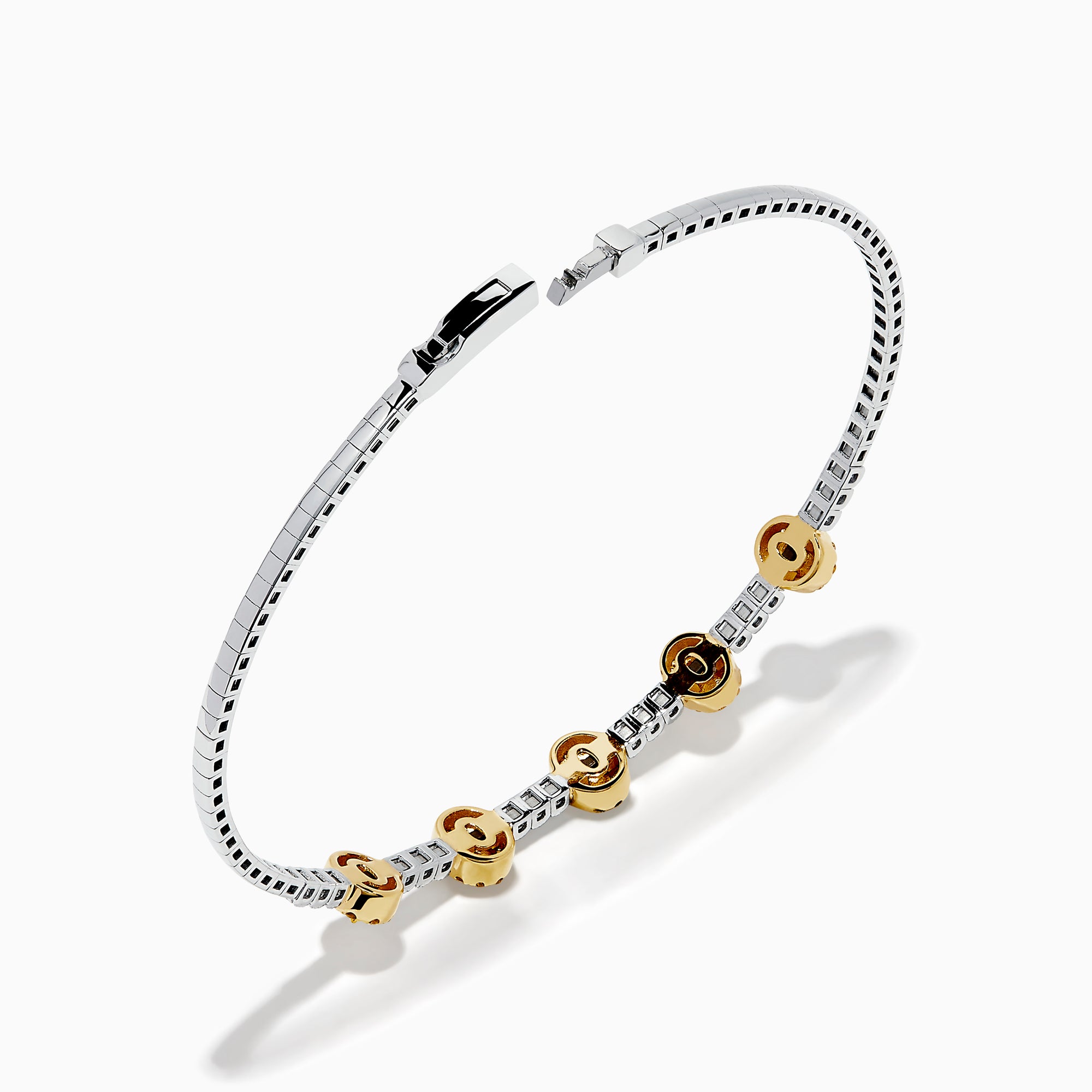 The Canare Platinum and 18K Yellow Gold Yellow and White Diamond Bangle features five oval yellow gold accents, each set with yellow diamonds, spaced along clear square-cut white diamonds for a sleek, elegant look.