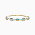The Aurora 14K Yellow Gold Opal and Diamond Bangle features five square opals in a row, accented with small white diamonds between each stone, shown on a white background.